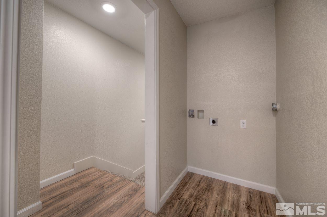 2150 Sutro Street, Unit A Reno, NV 89512 - Photo 11 of 25 a view of hallway with wooden floor