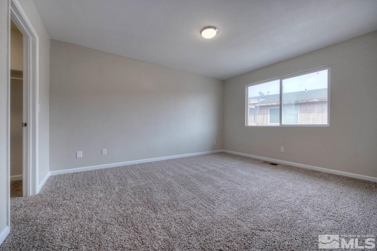 2150 Sutro Street, Unit A Reno, NV 89512 - Photo 12 of 25 an empty room with a window