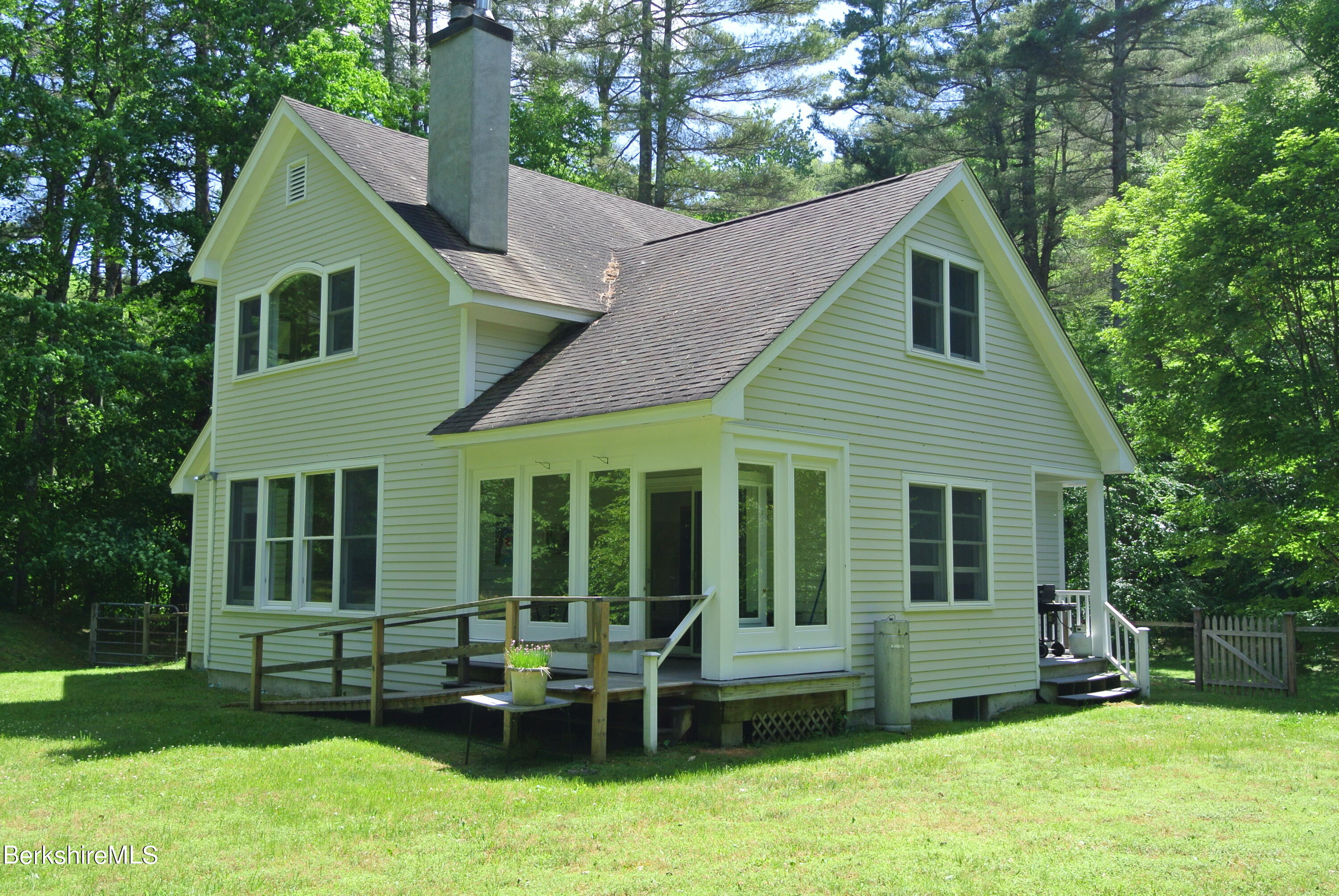 65 Monument Valley Road Great Barrington, MA 01230 - Photo 3 of 32 Screened porch off the dining room