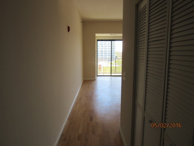 4848 North Sheridan Road, Unit 802 Chicago, IL 60640 - Photo 3 of 11 a view of an empty room and window