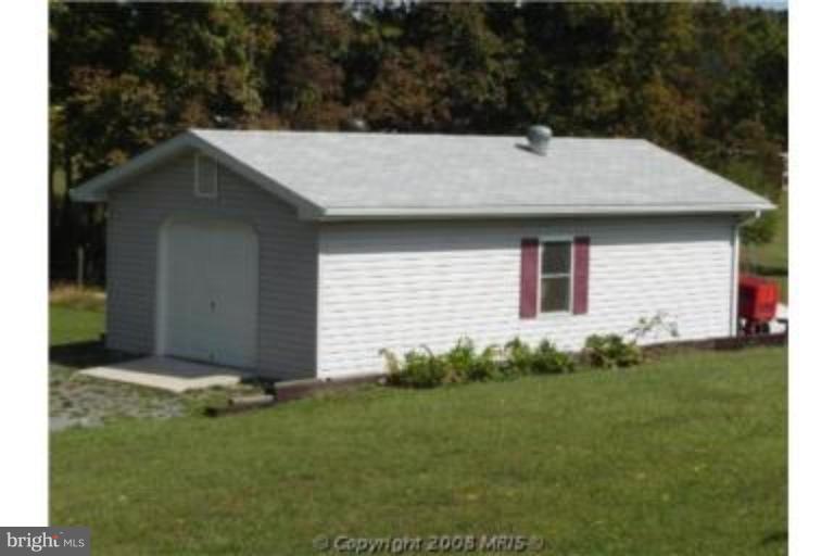49 Cedar Ridge Road Berkeley Springs, WV 25411 - Photo 3 of 12 Garage 1