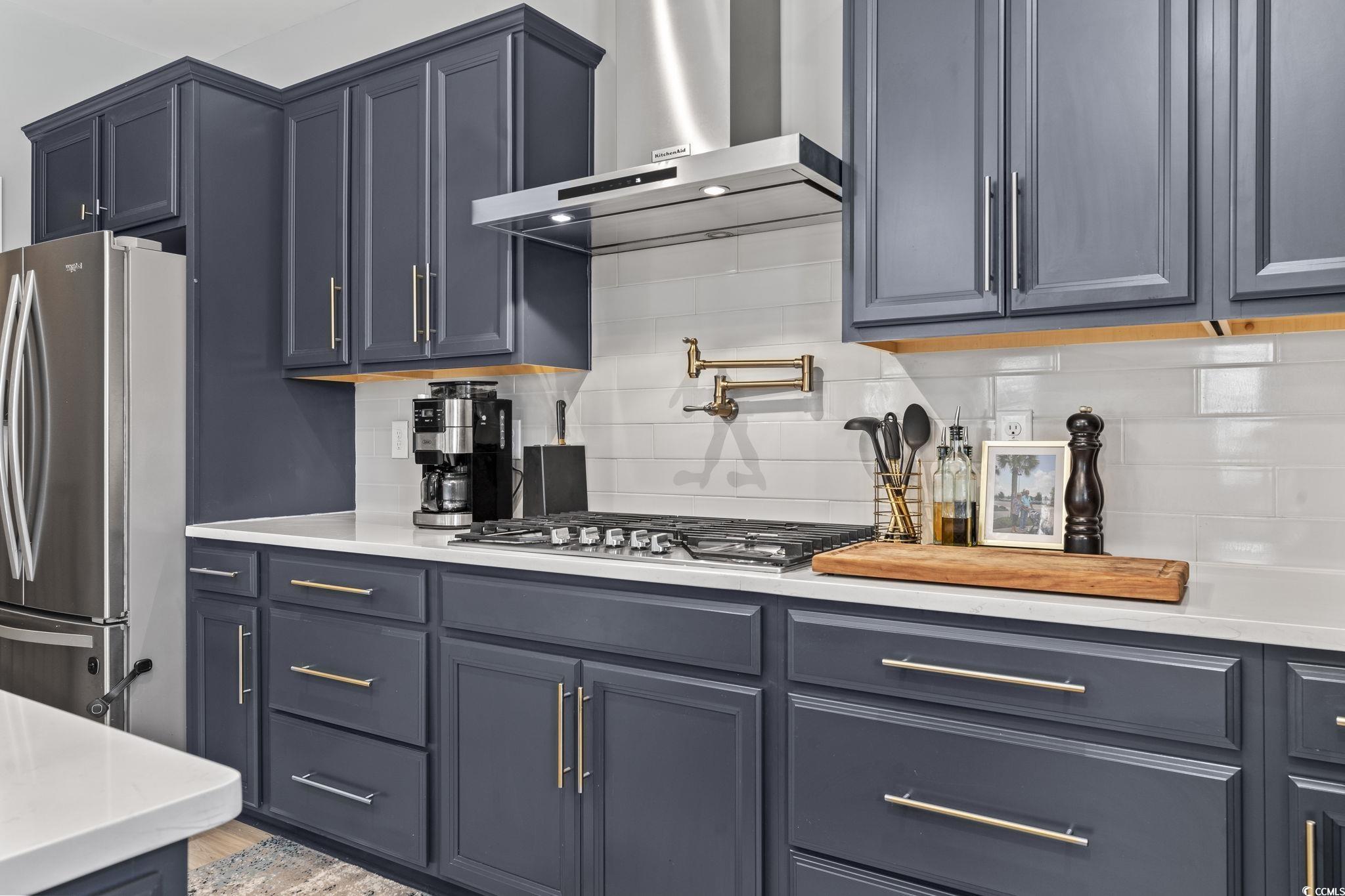 375 Bumble Circle Murrells Inlet, SC 29576 - Photo 14 of 40 Kitchen with hardwood / wood-style flooring, wall