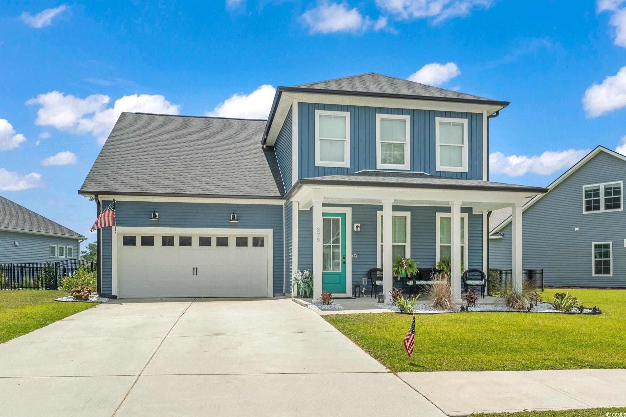 375 Bumble Circle Murrells Inlet, SC 29576 - Photo 4 of 40 View of property with a porch, a garage, and a fro