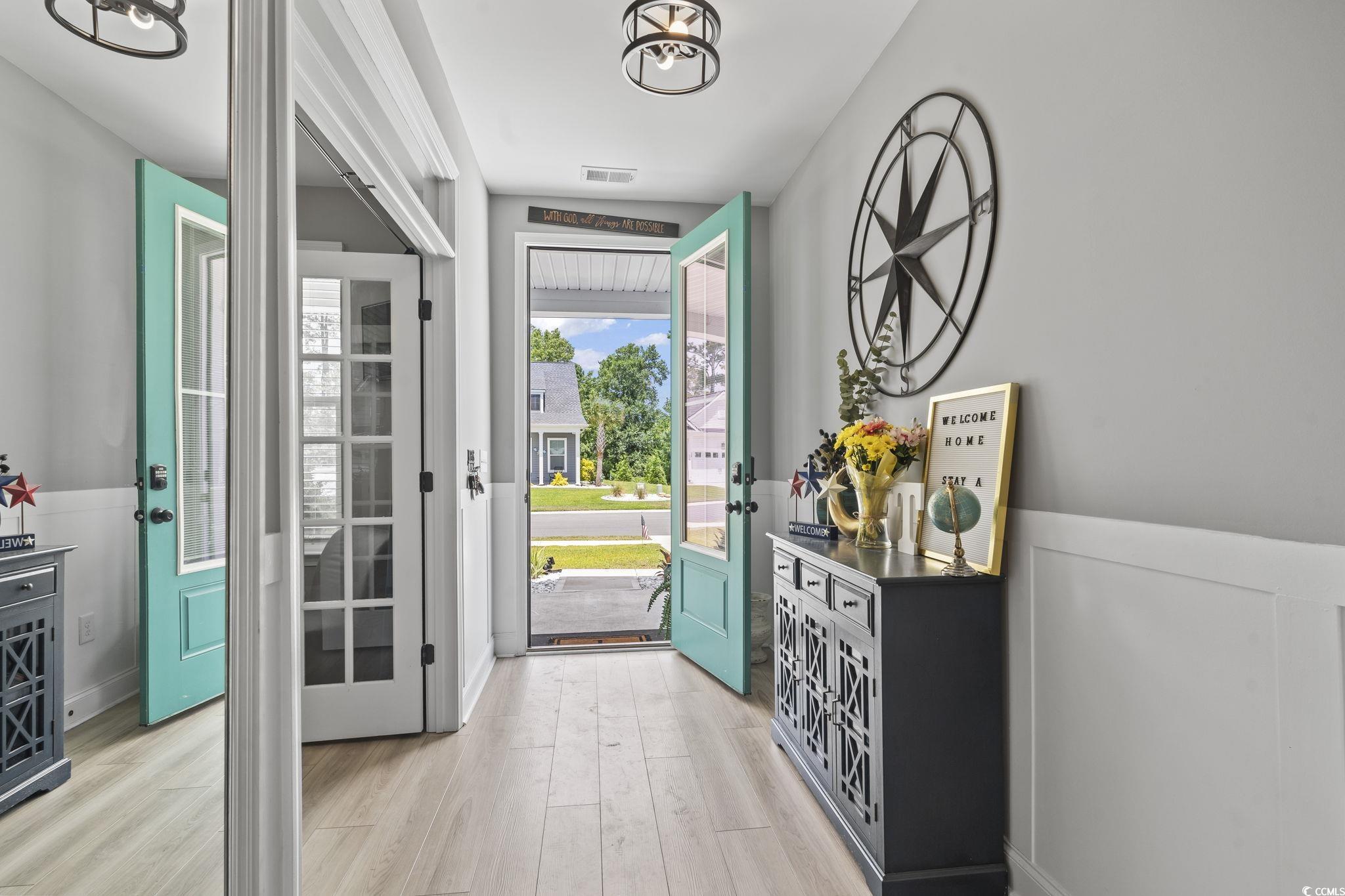 375 Bumble Circle Murrells Inlet, SC 29576 - Photo 5 of 40 Foyer entrance with light hardwood / wood-style fl