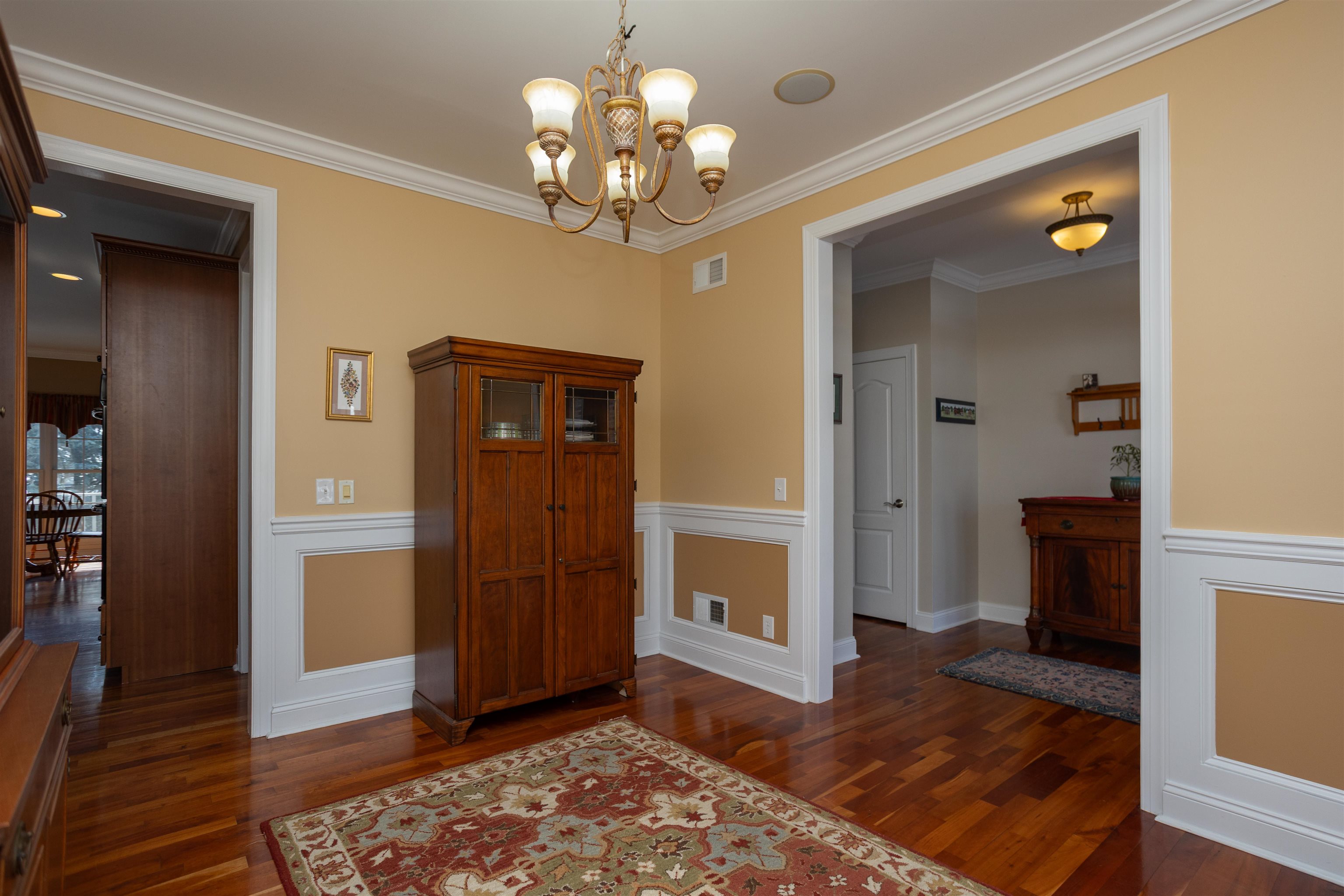 203 Keswick Circle Dayton, VA 22821 - Photo 11 of 73 a view of a hallway with wooden floor and a livingroom view