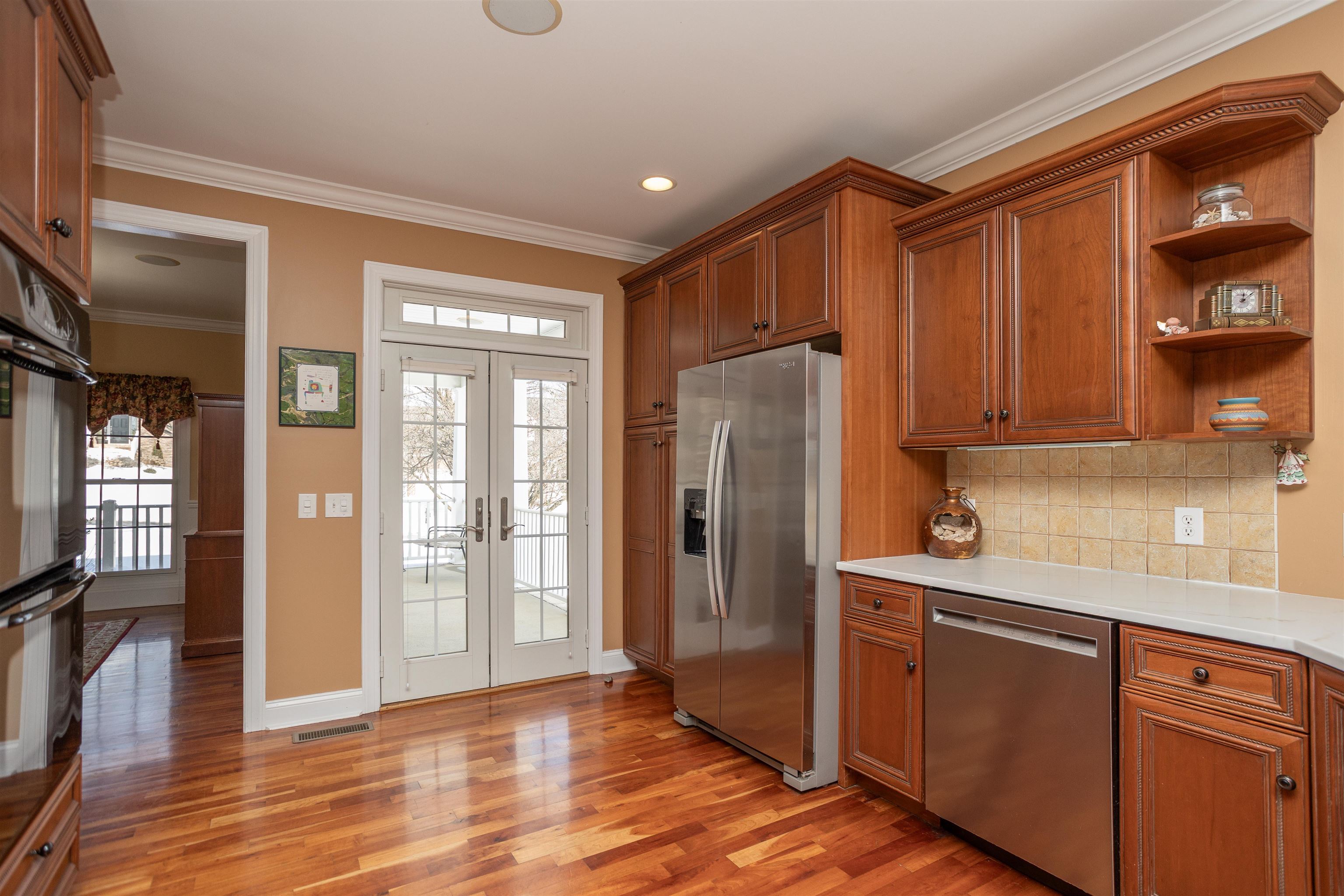 203 Keswick Circle Dayton, VA 22821 - Photo 17 of 73 a kitchen with stainless steel appliances granite countertop a refrigerator and a sink