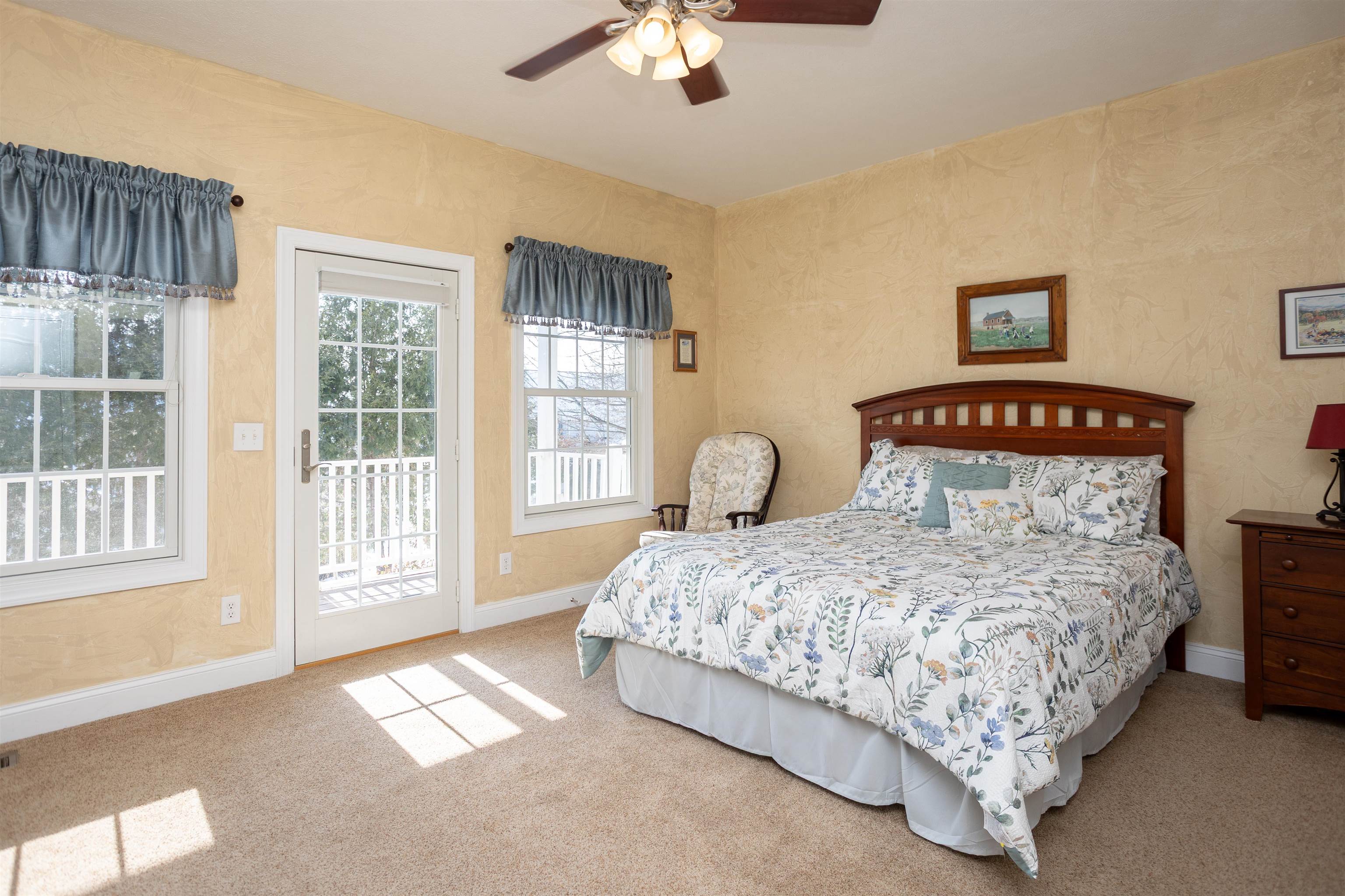 203 Keswick Circle Dayton, VA 22821 - Photo 24 of 73 a bedroom with a bed a chandelier and a window
