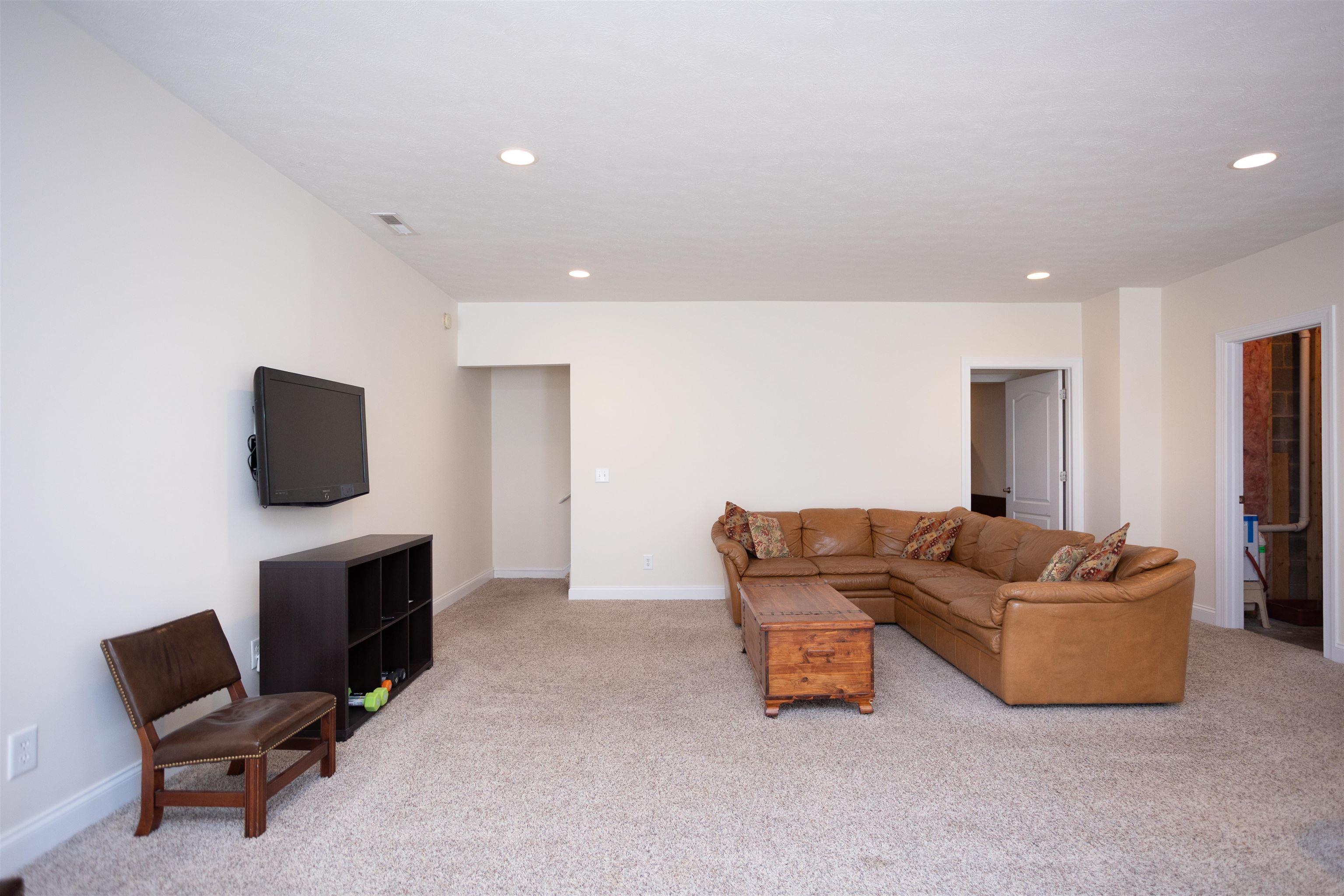 203 Keswick Circle Dayton, VA 22821 - Photo 50 of 73 a living room with furniture and a flat screen tv