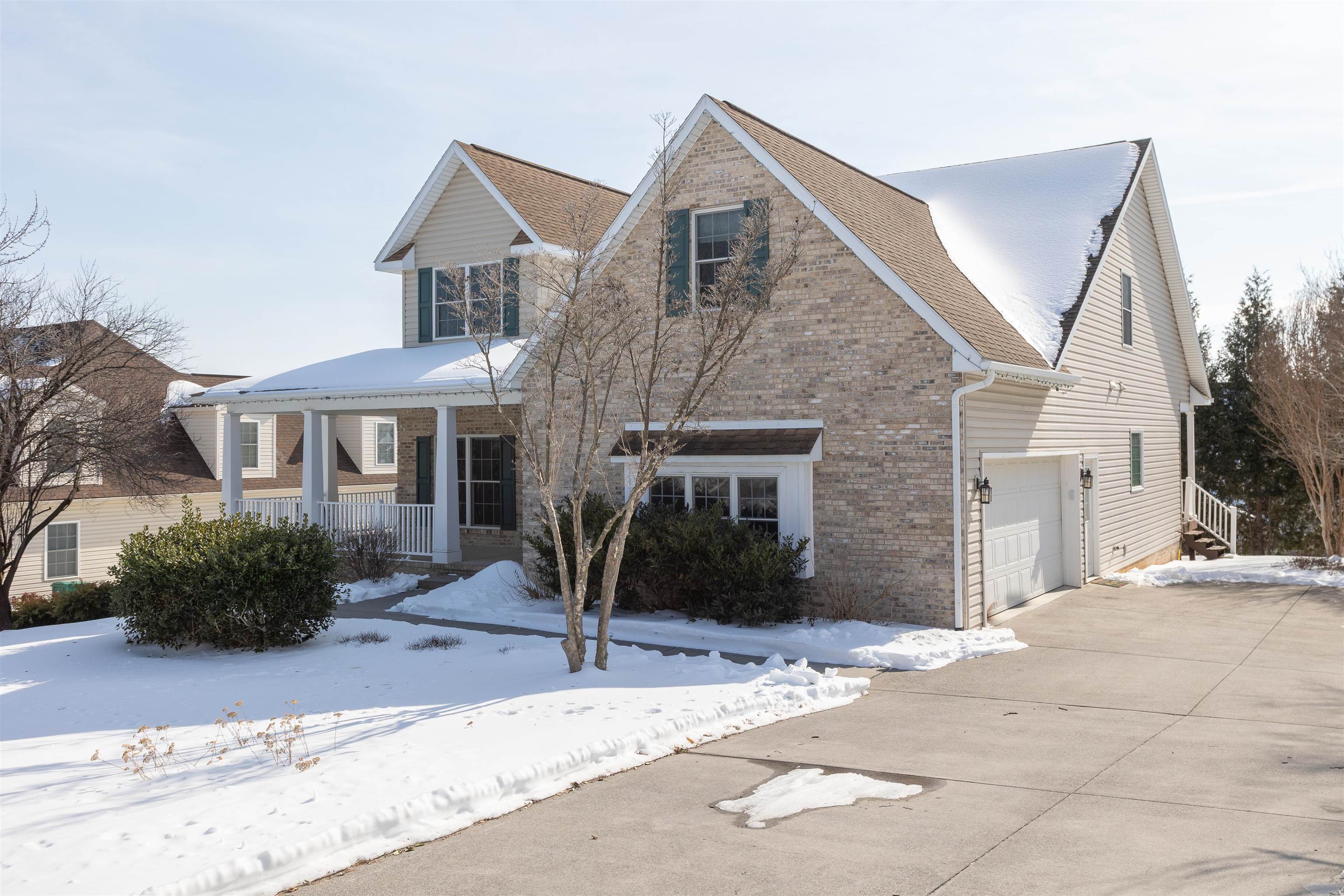 203 Keswick Circle Dayton, VA 22821 - Photo 70 of 73 a front view of a house with a yard and garage