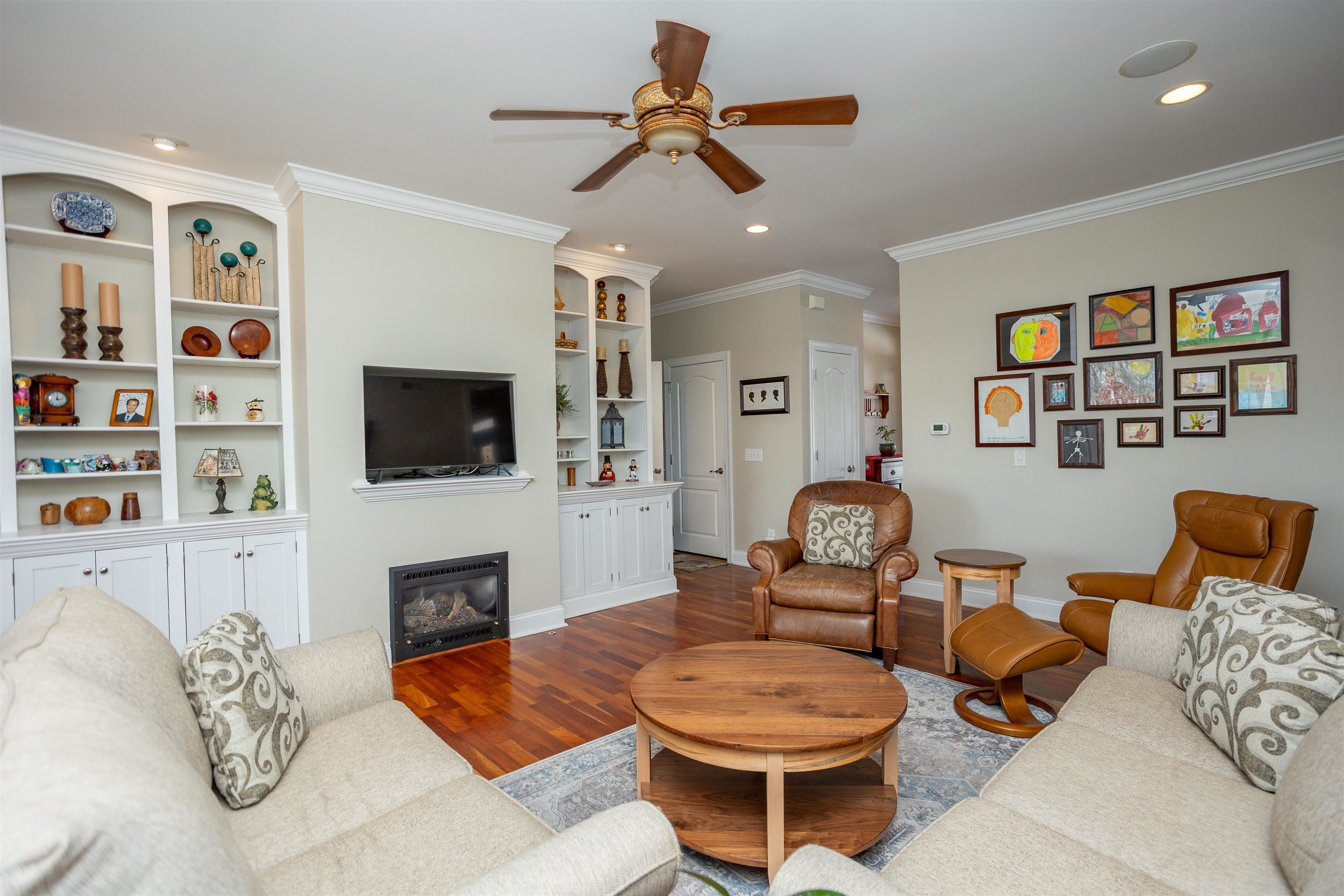203 Keswick Circle Dayton, VA 22821 - Photo 7 of 73 a living room with furniture a flat screen tv and kitchen view