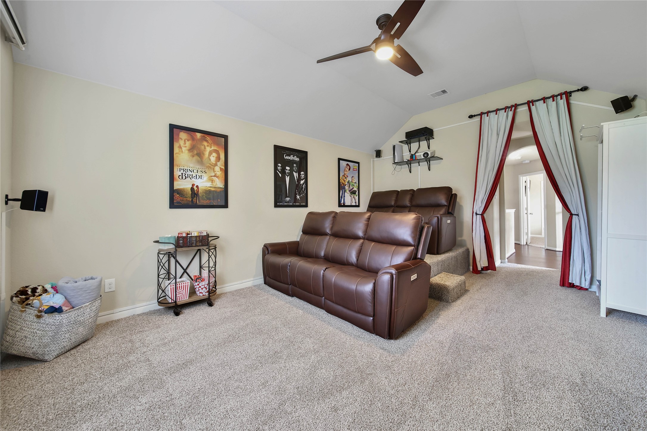 9223 Wapiti Trail Conroe, TX 77303 - Photo 30 of 45 a living room with furniture and a flat screen tv