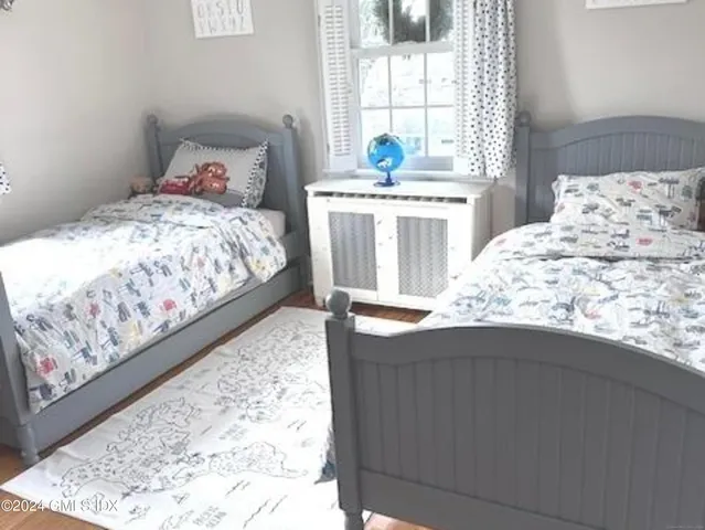 a view of a balcony with chairs