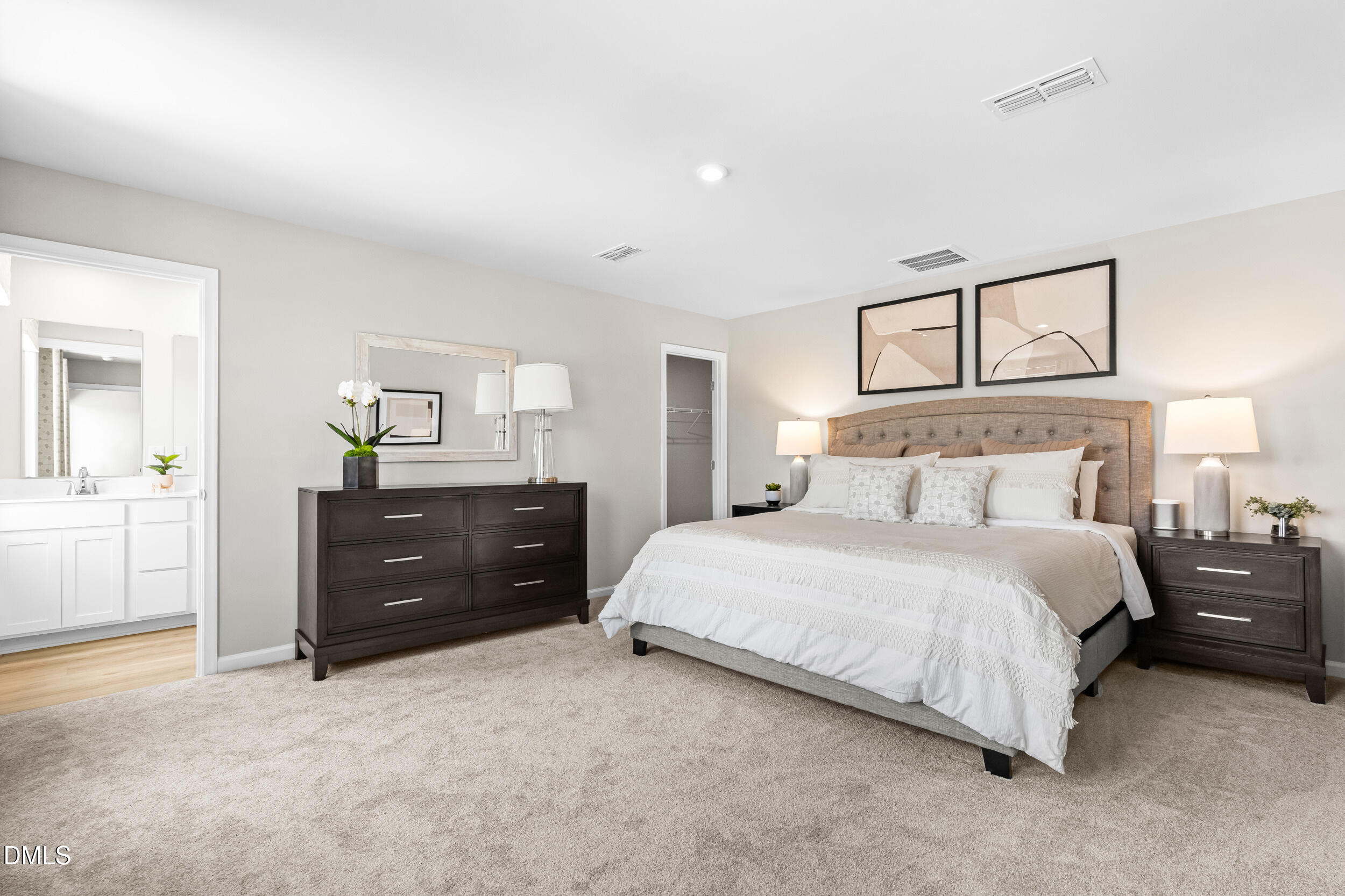 4015 Moth Trail Bailey, NC 27807 - Photo 14 of 26 a bedroom with a bed and a dresser
