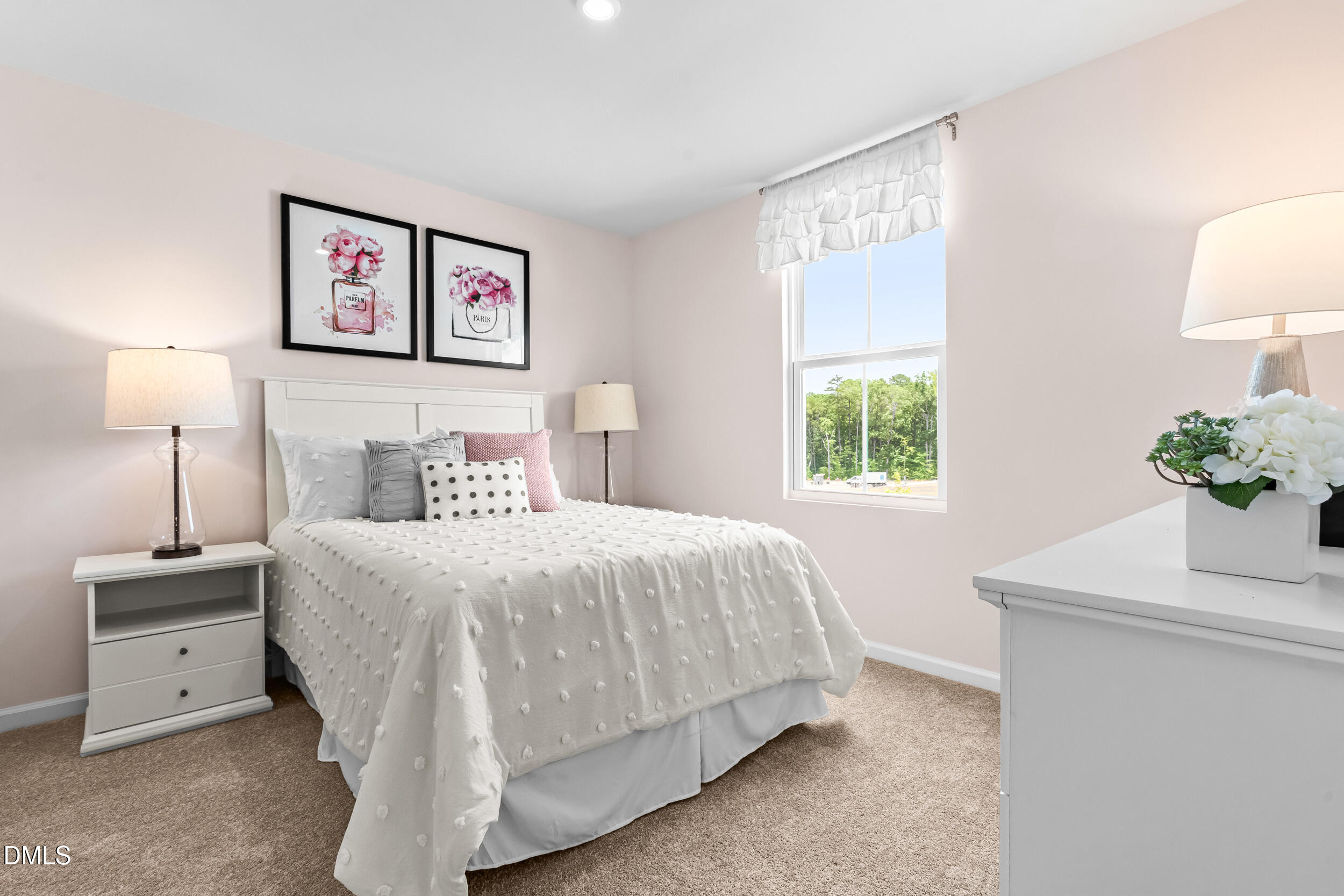 4015 Moth Trail Bailey, NC 27807 - Photo 21 of 26 a bedroom with a bed and a window