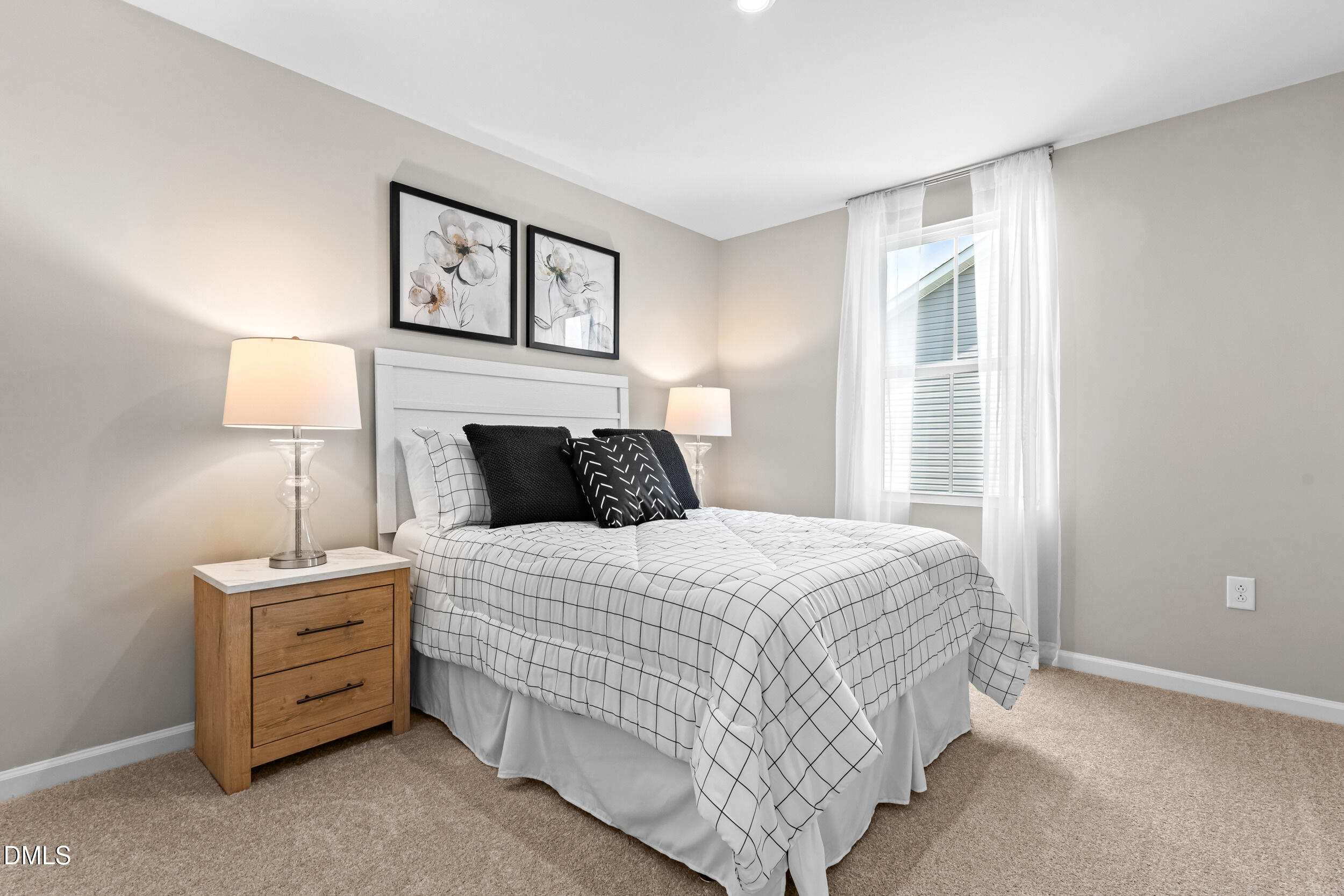 4015 Moth Trail Bailey, NC 27807 - Photo 22 of 26 a bedroom with a bed and a night stand