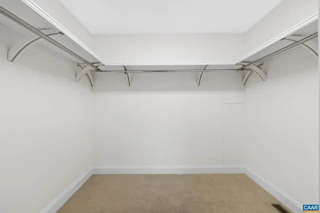 a spacious bathroom with a bathtub sink and toilet