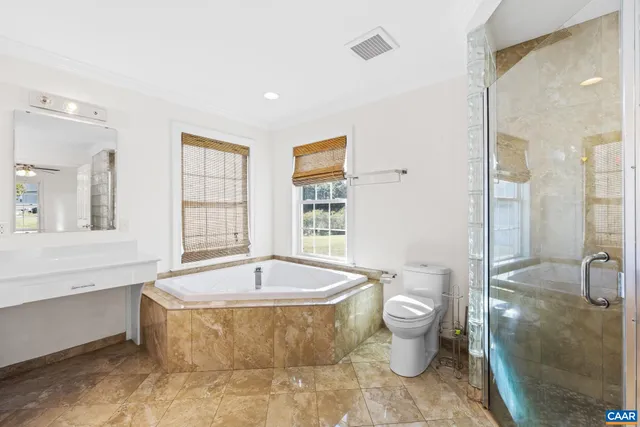 a bathroom with a sink a toilet and a bathtub