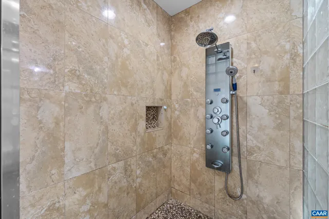 a view of a ceiling fan in a room