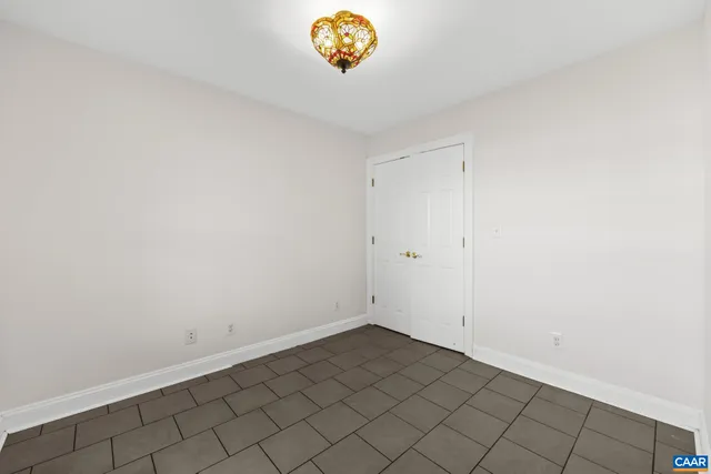 a view of a livingroom with wooden floor