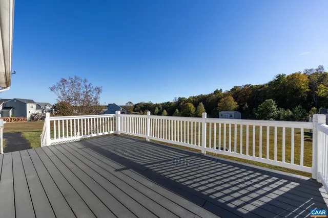 a view of a chairs and table in the patio