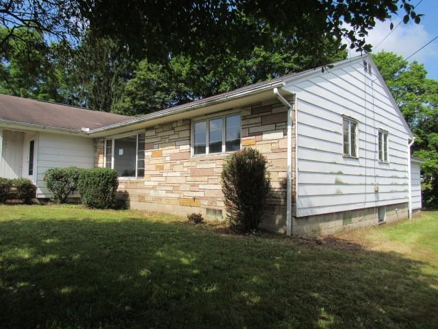 368 Coleman Street Hastings, PA 16646 - Photo 2 of 20 a backyard of a house with seating space