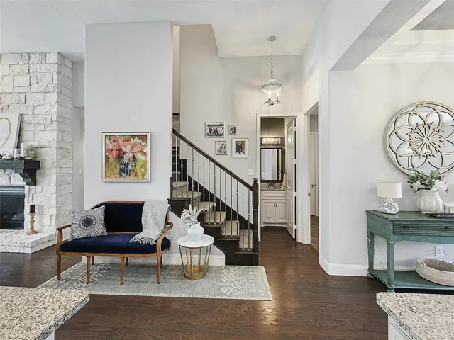 a open kitchen with stainless steel appliances granite countertop a sink stove and refrigerator