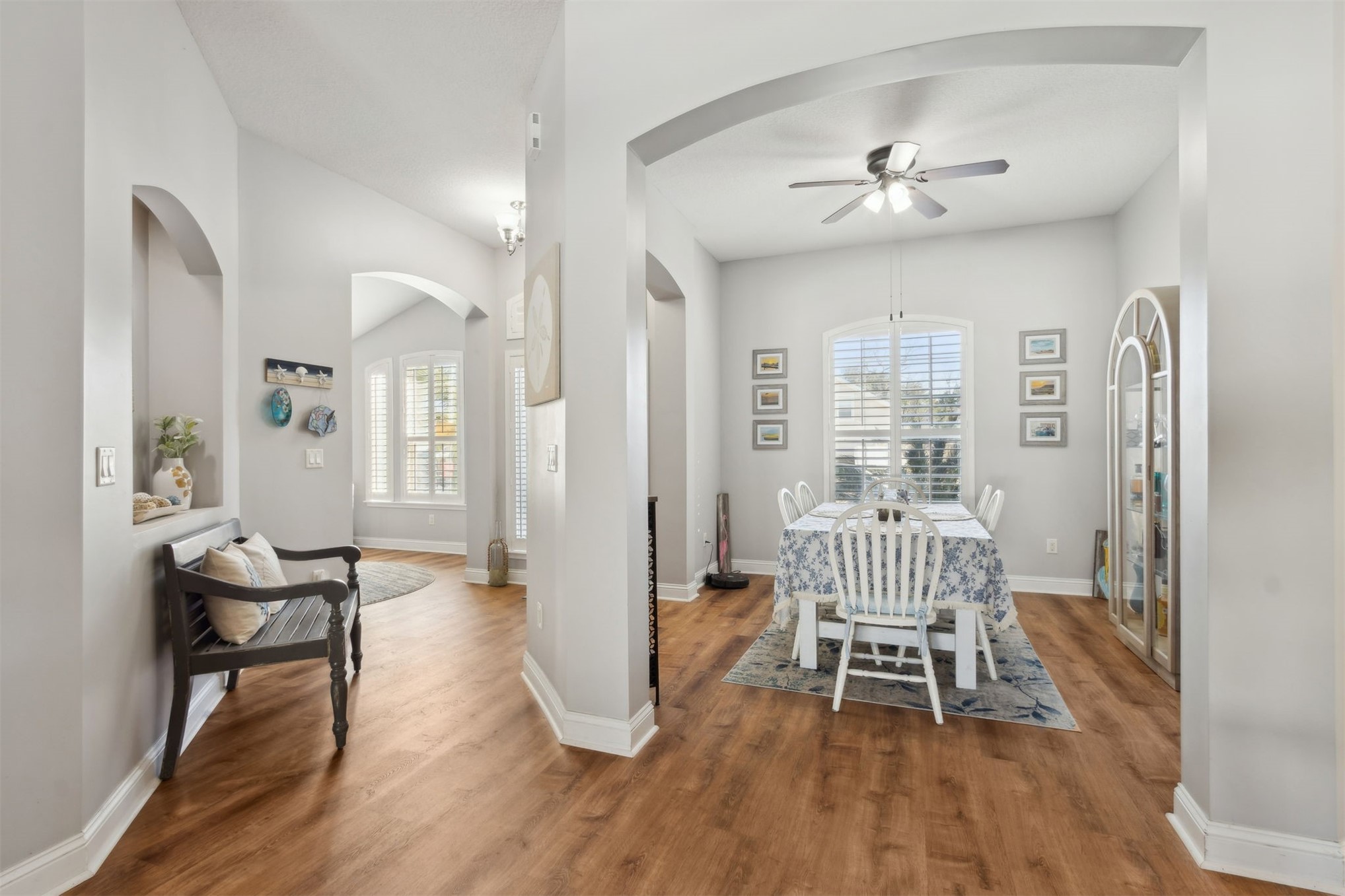 86027 Maple Leaf Place Yulee, FL 32097 - Photo 12 of 38 a view of a livingroom with furniture and wooden floor