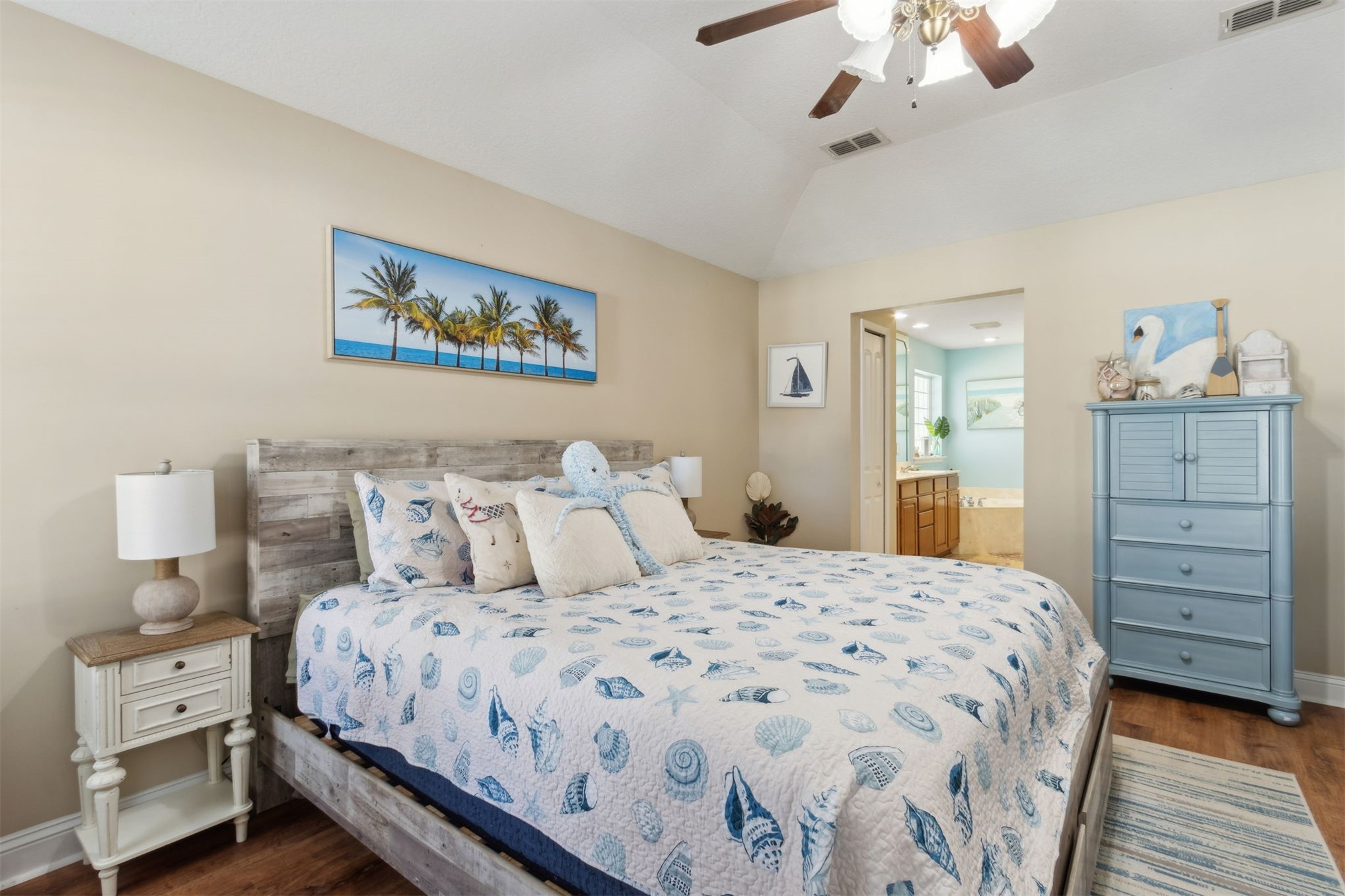 86027 Maple Leaf Place Yulee, FL 32097 - Photo 21 of 38 a bedroom with a bed and wooden floor