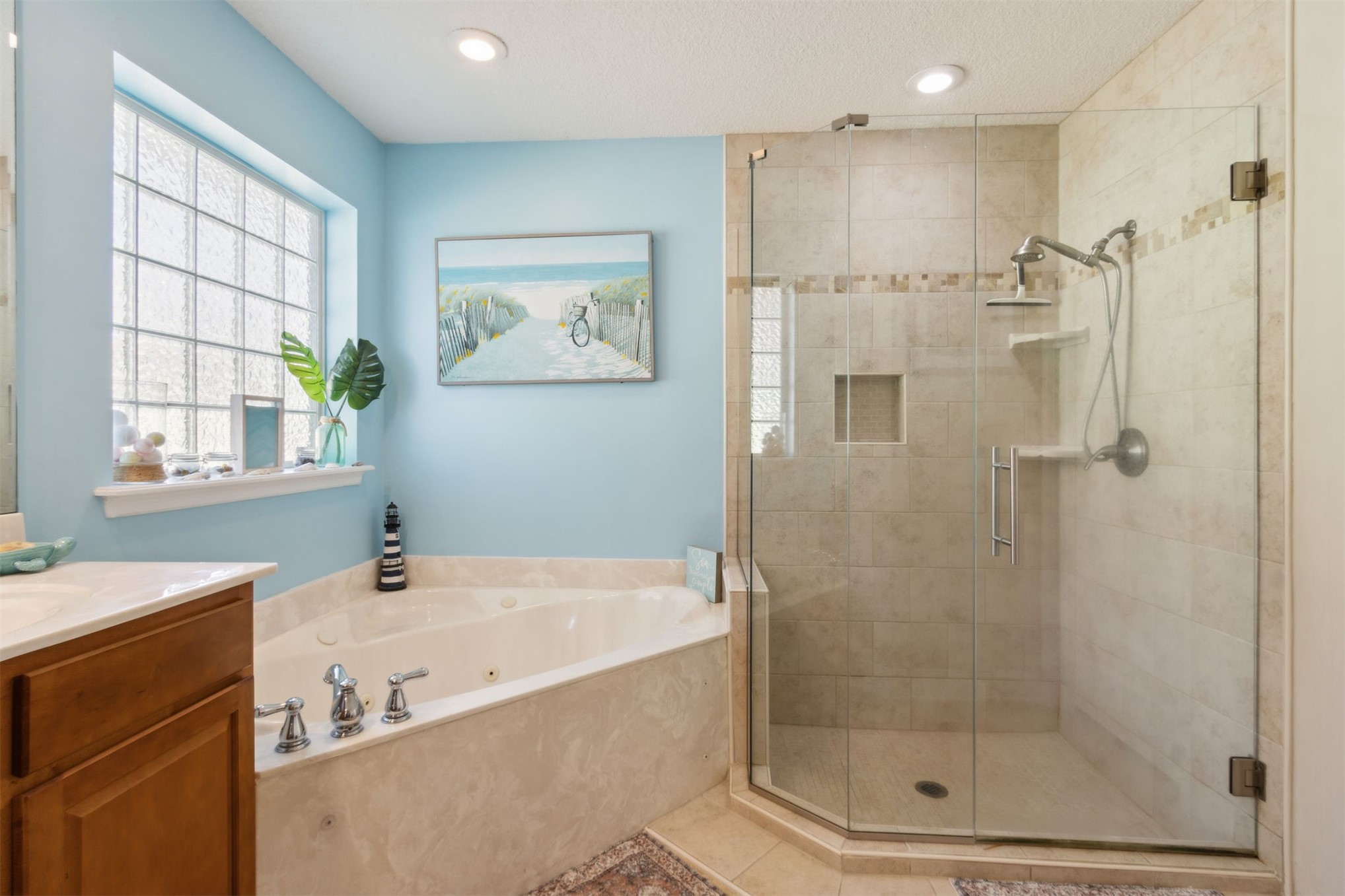 86027 Maple Leaf Place Yulee, FL 32097 - Photo 23 of 38 a bathroom with a bathtub and a shower