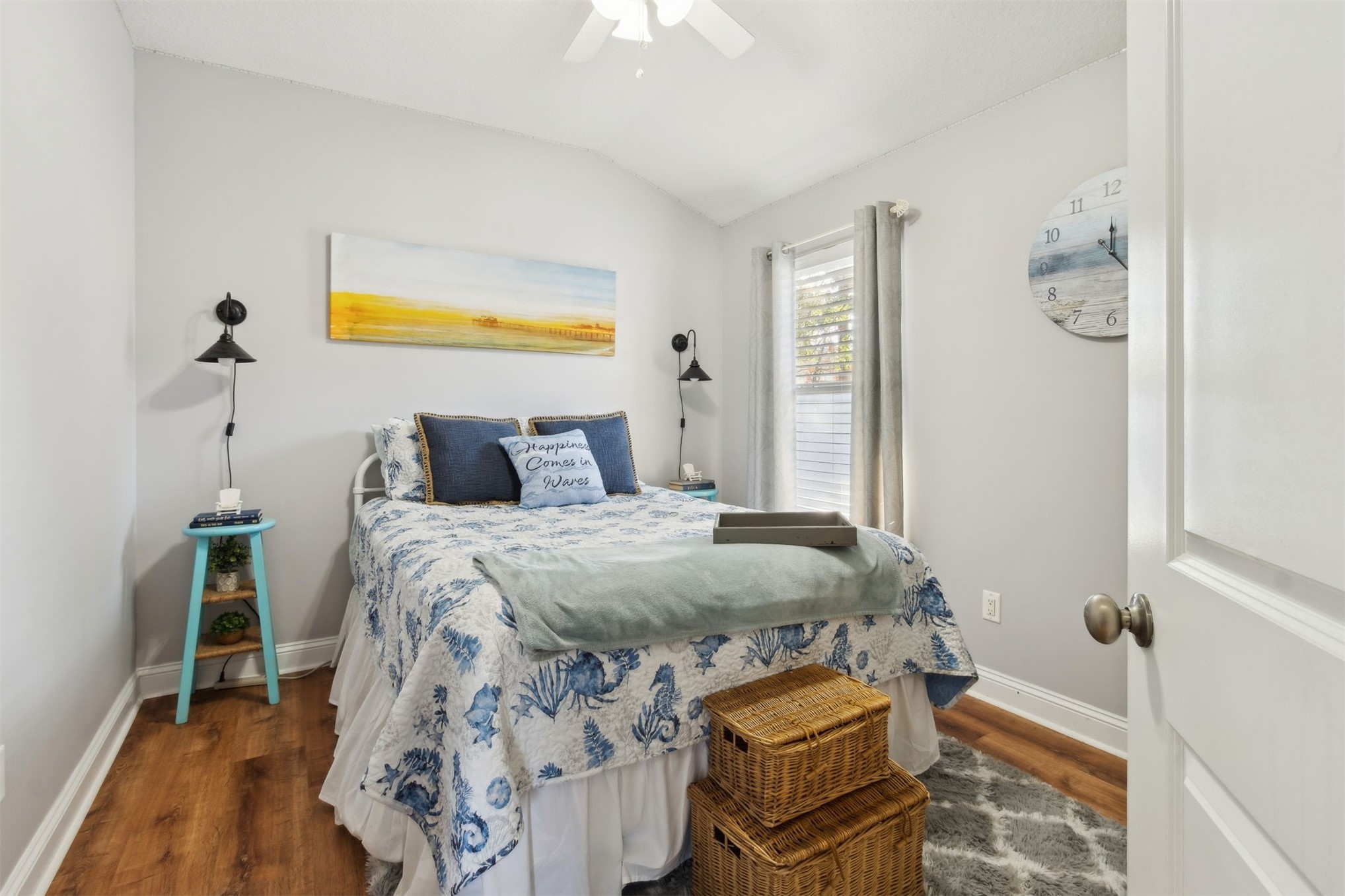 86027 Maple Leaf Place Yulee, FL 32097 - Photo 26 of 38 a bedroom with a bed and wooden floor