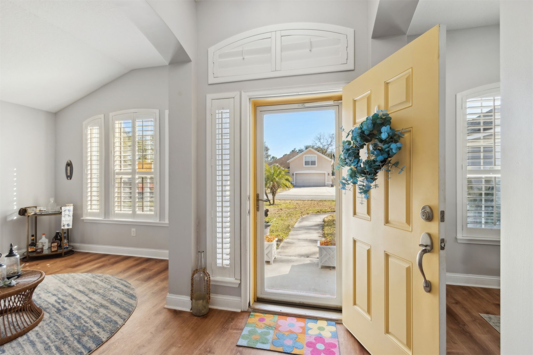 86027 Maple Leaf Place Yulee, FL 32097 - Photo 5 of 38 a bedroom with a bed and a window