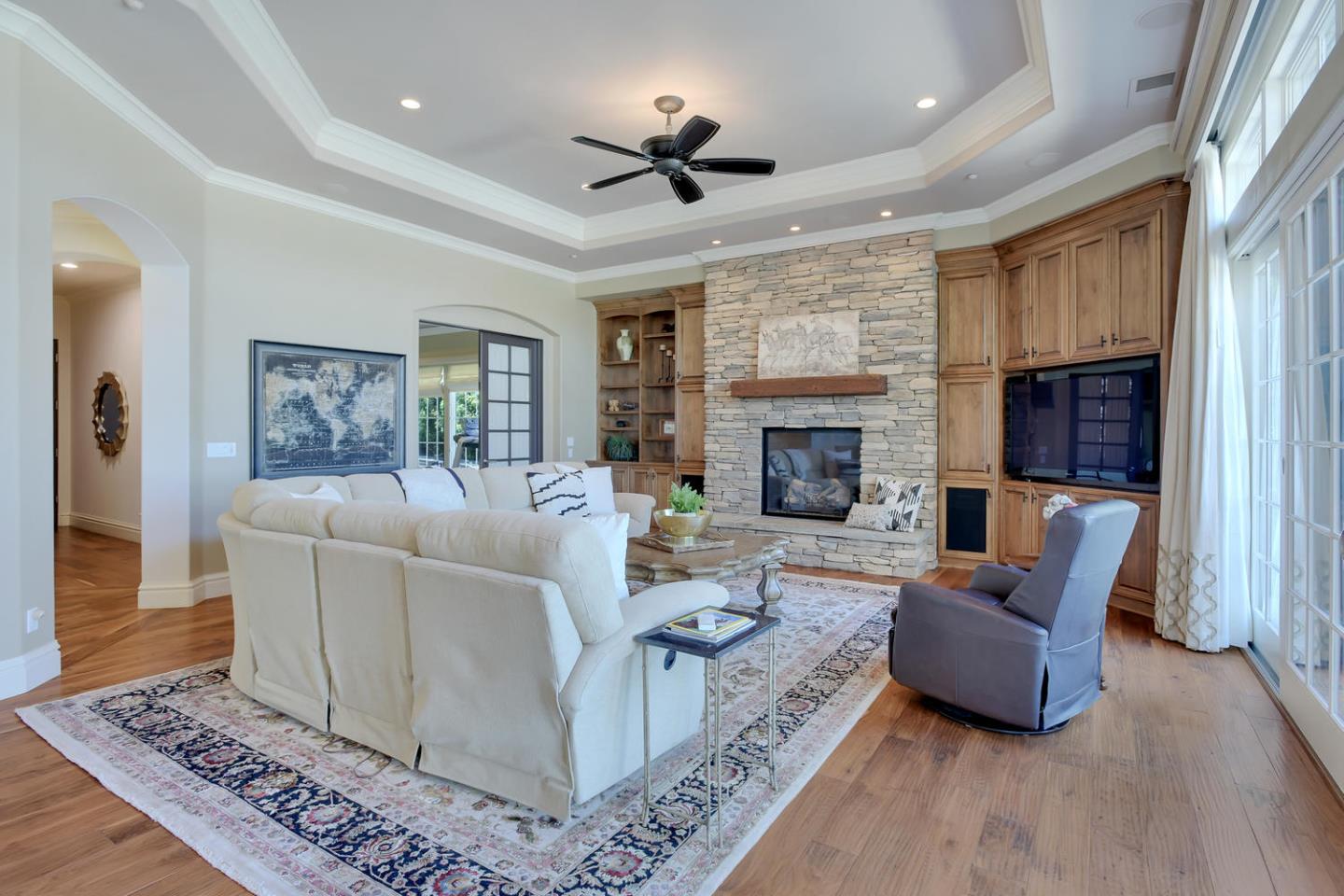 18485 Withey Road Monte Sereno, CA 95030 - Photo 14 of 39 a living room with furniture and a fireplace