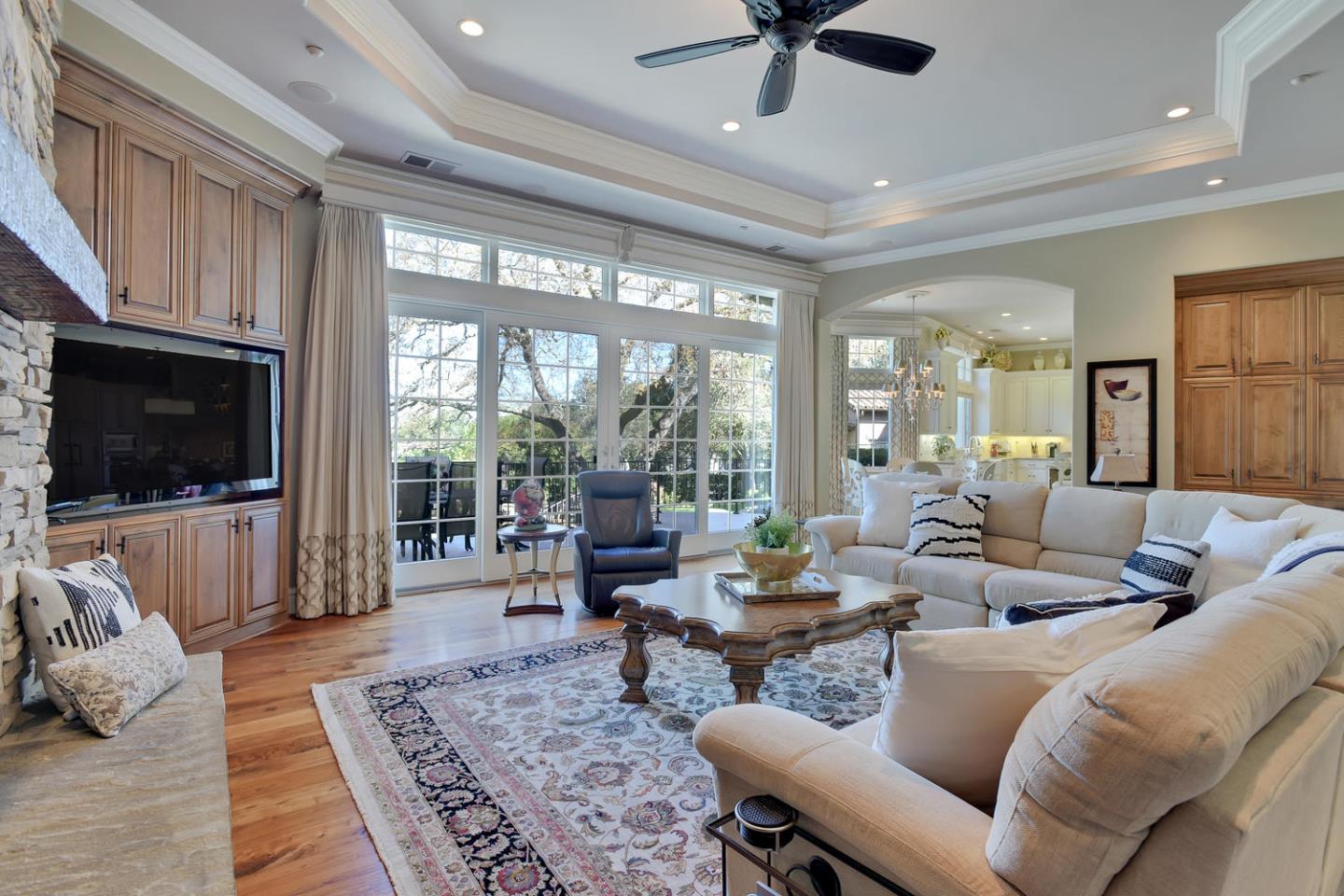 18485 Withey Road Monte Sereno, CA 95030 - Photo 15 of 39 a living room with furniture and a flat screen tv