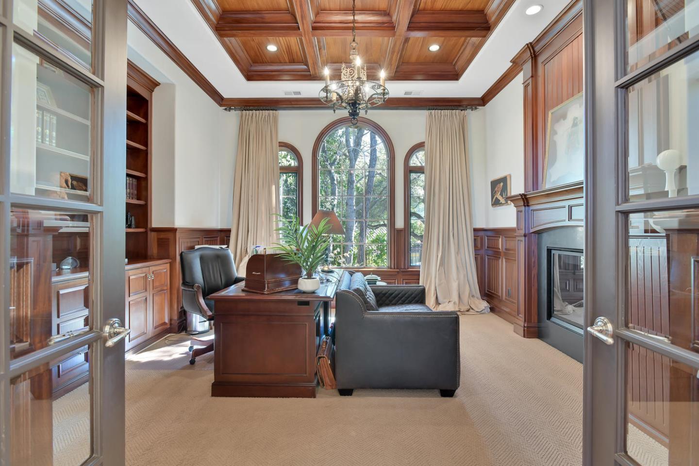 18485 Withey Road Monte Sereno, CA 95030 - Photo 16 of 39 a living room with fireplace furniture and a large window