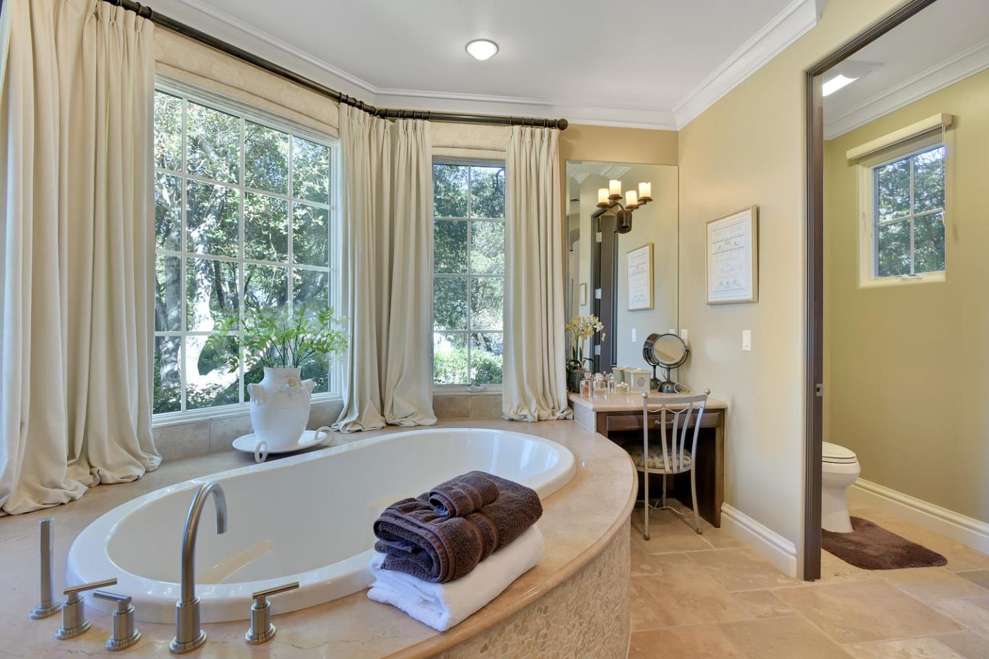 18485 Withey Road Monte Sereno, CA 95030 - Photo 21 of 39 a living room with furniture and a large window