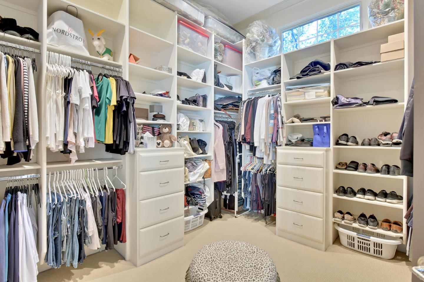 18485 Withey Road Monte Sereno, CA 95030 - Photo 22 of 39 a view of walk in closet with clothes and shoes