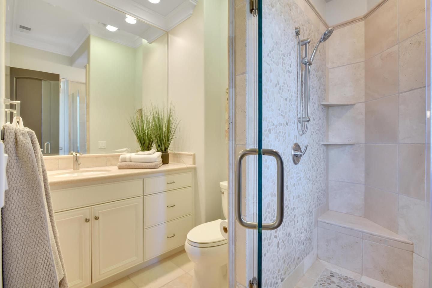 18485 Withey Road Monte Sereno, CA 95030 - Photo 28 of 39 a bathroom with a granite countertop sink toilet and shower