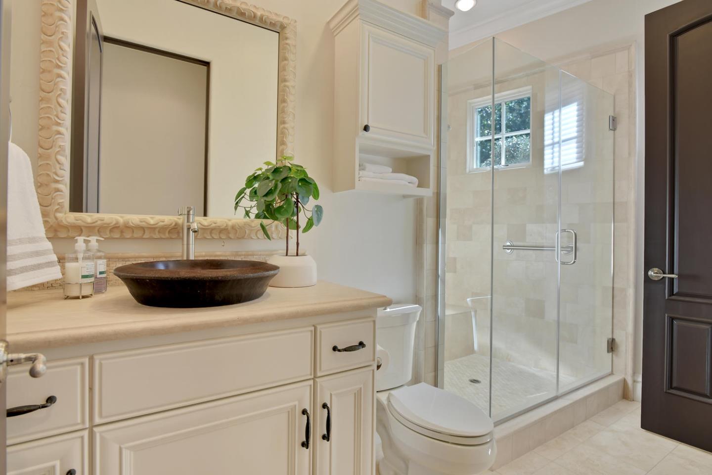 18485 Withey Road Monte Sereno, CA 95030 - Photo 30 of 39 a bathroom with a sink a toilet and shower