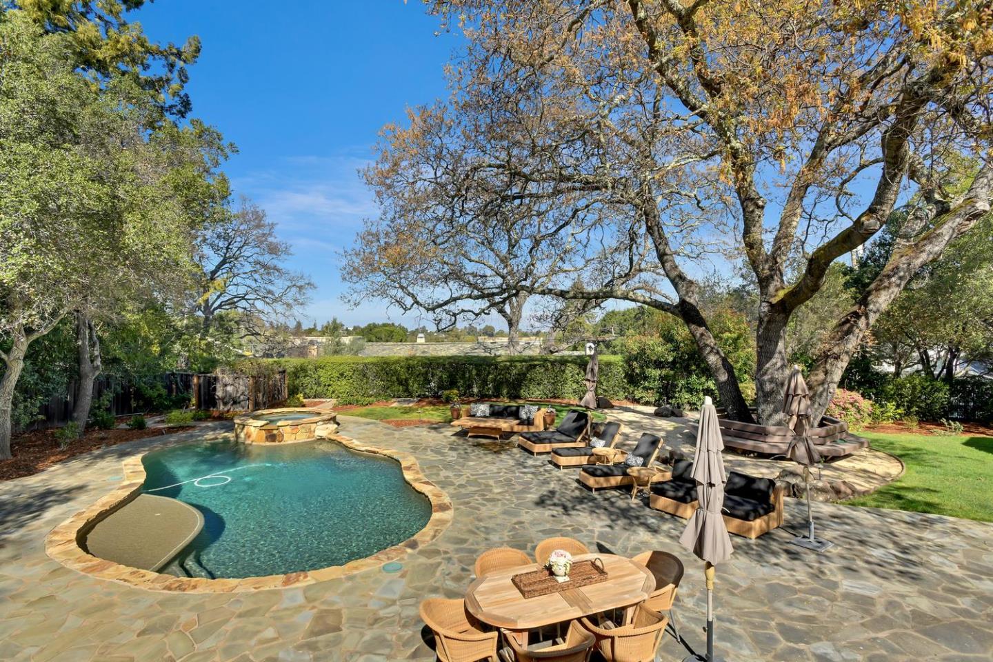 18485 Withey Road Monte Sereno, CA 95030 - Photo 32 of 39 a view of a backyard with swimming pool