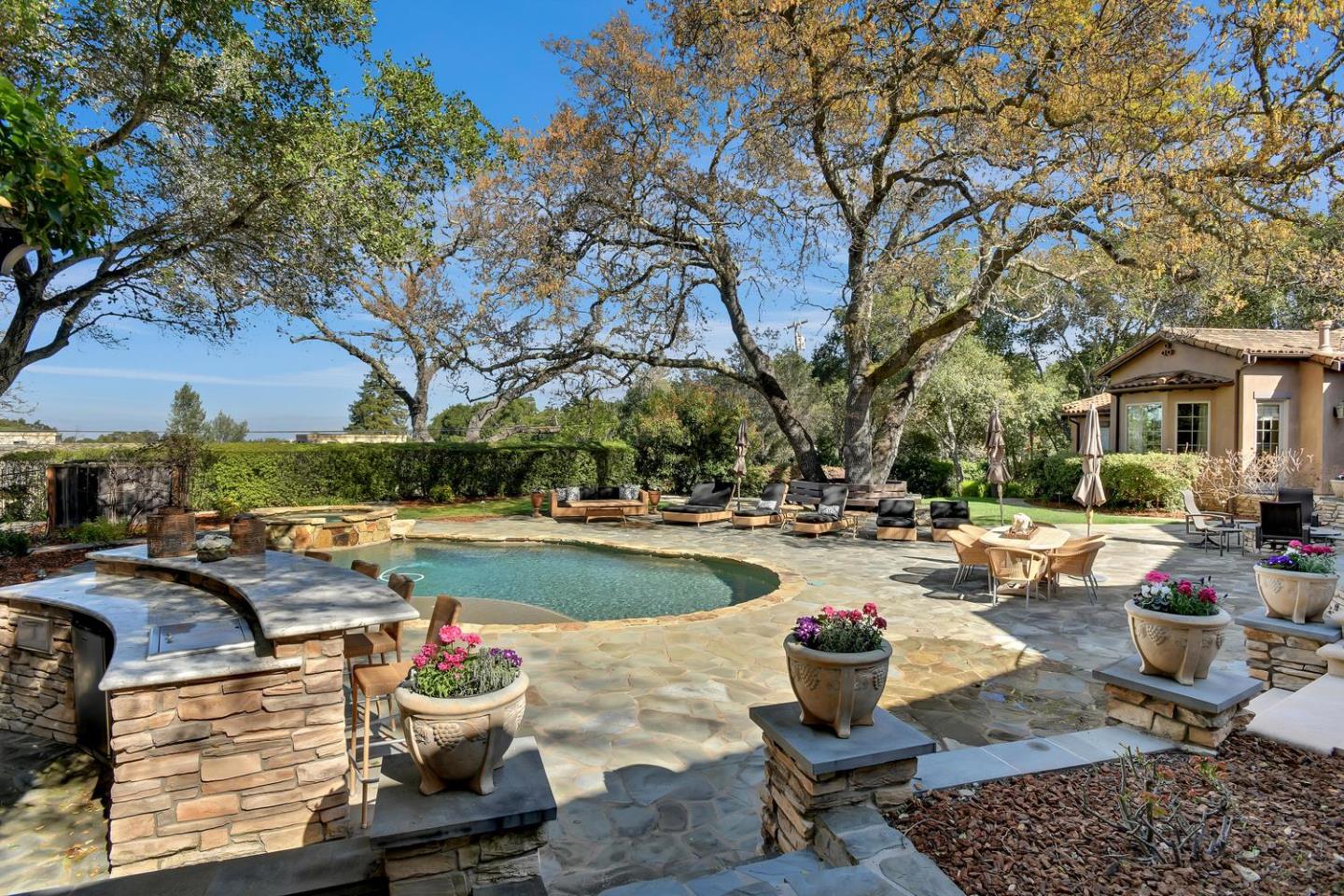 18485 Withey Road Monte Sereno, CA 95030 - Photo 33 of 39 a view of a patio with swimming pool