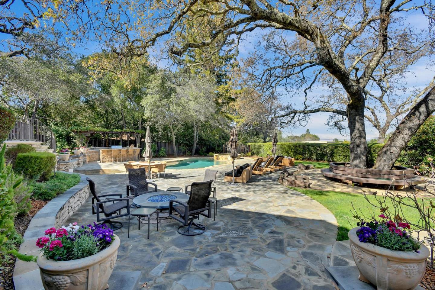 18485 Withey Road Monte Sereno, CA 95030 - Photo 34 of 39 a view of a backyard with sitting area and garden