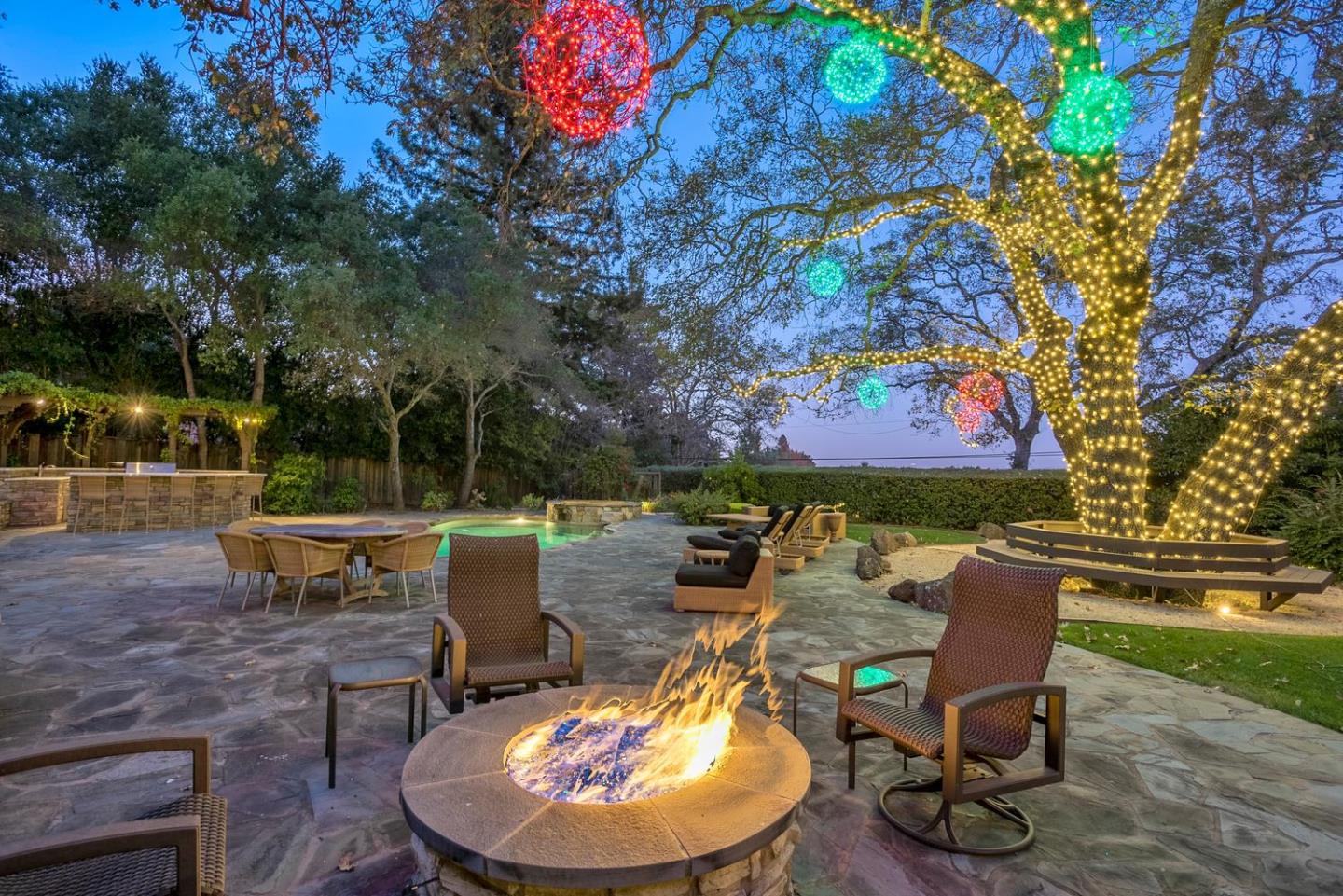 18485 Withey Road Monte Sereno, CA 95030 - Photo 35 of 39 a view of a chairs and table in backyard of the house