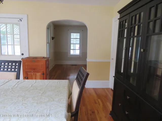 a view of balcony with furniture