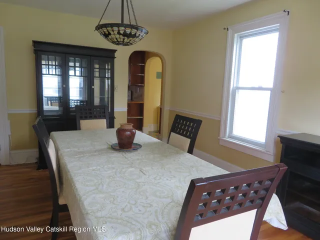 a view of a livingroom with furniture and window