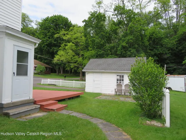 a view of a backyard with a garden