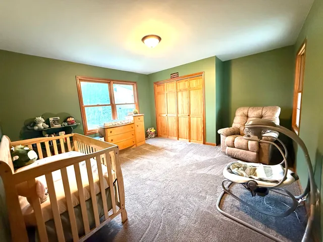 a room with furniture and a large window