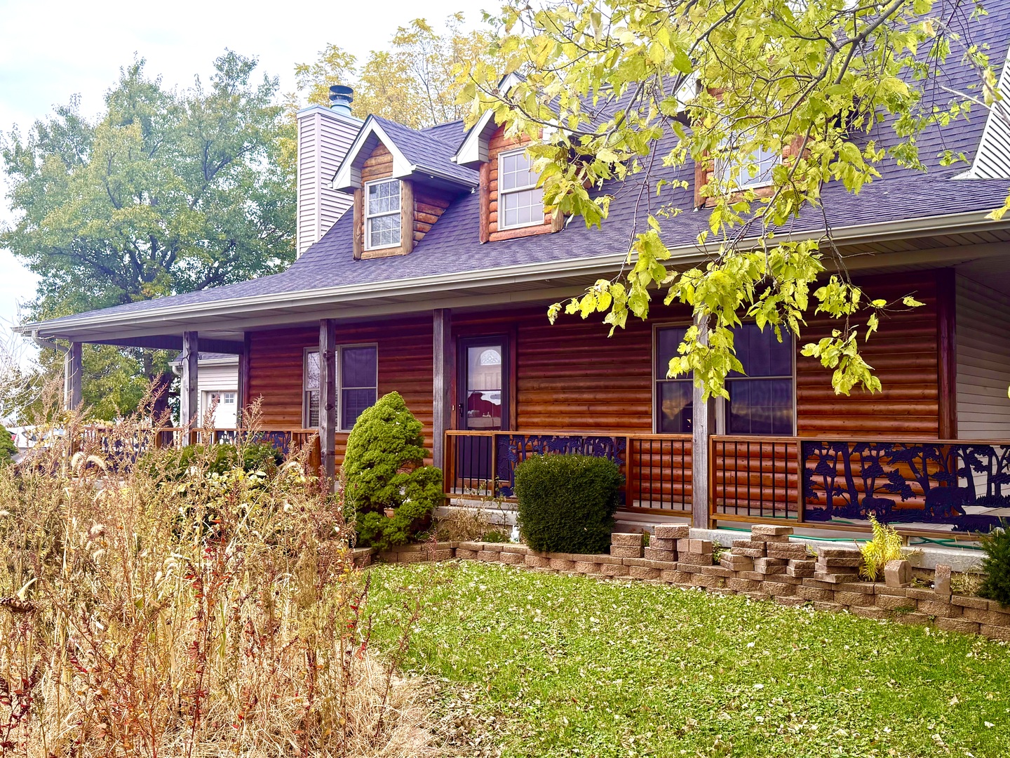 14944 South Steward Road Rochelle, IL 61068 - Photo 2 of 32 a front view of a house with garden