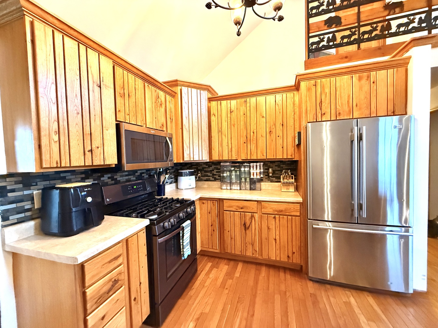 14944 South Steward Road Rochelle, IL 61068 - Photo 9 of 32 a kitchen with stainless steel appliances a refrigerator and a stove top oven