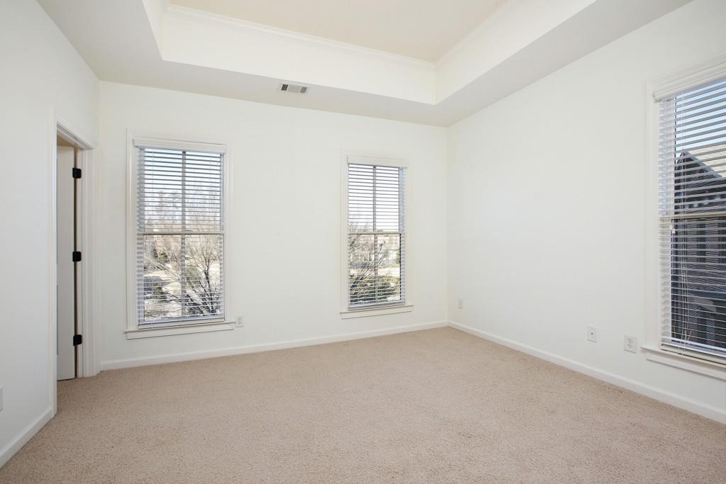 2010 Heathermere Way Roswell, GA 30075 - Photo 24 of 42 an empty room with windows