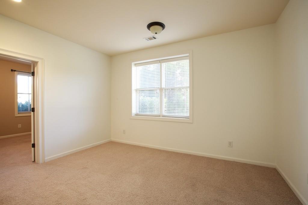 2010 Heathermere Way Roswell, GA 30075 - Photo 33 of 42 an empty room with a window